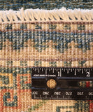 7' Hand Knotted Kazak Area Rug